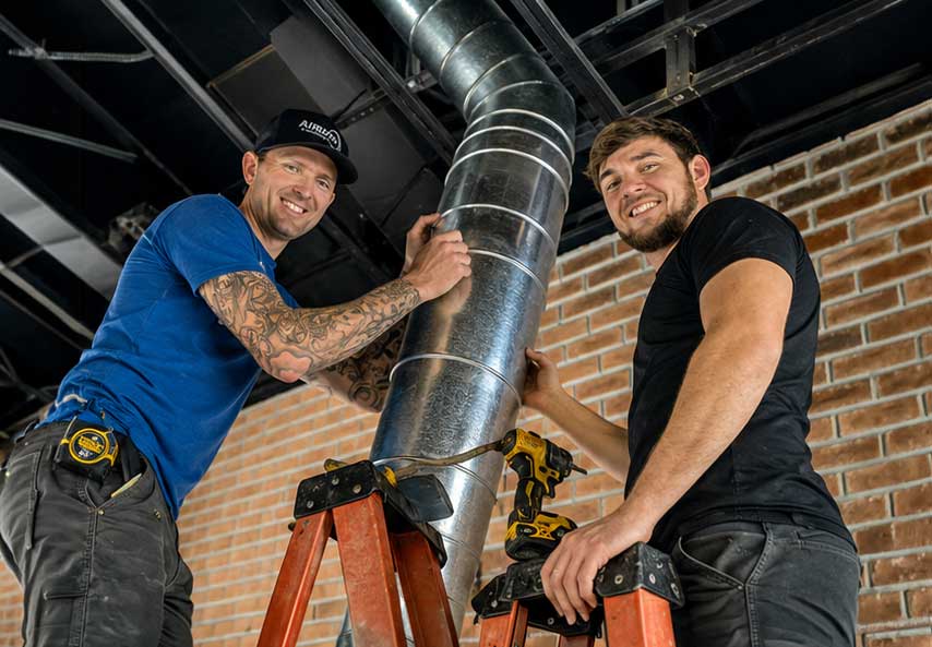 Airrific-technicians-replacing-air-duct