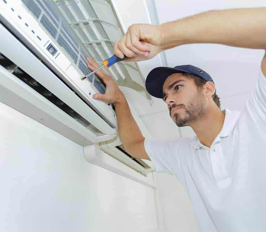 Mini-split-ac-installation Airrific technician is working on Mini-split AC installation