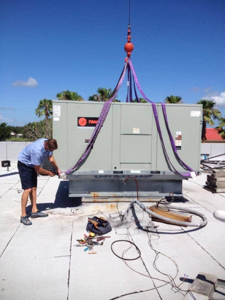 Airrifice HVAC technician installing new HVAC system